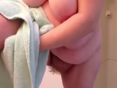 After taking a shower, my enormous white wife dries her shaggy cum hole and large pointer sisters.